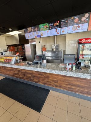 Order and kitchen area  at Pizza Pizza in Guelph