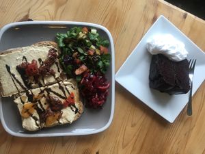 Lunchtime treat - country bumpkin- hummus, roasted veg with balsamic dressing on warm bread with fresh mixed salad & beetroot slaw followed by warm chocolate fudge cake & cream  at Caffè No 3 @ Home in Durham
