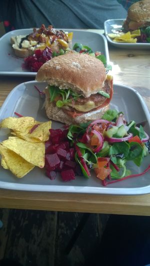 Loaded cheeseburger and sides  at Caffè No 3 @ Home in Durham