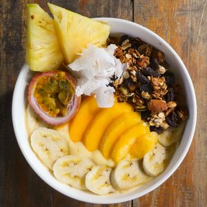 Tropical Smoothie Bowl

Blend of frozen seasonal fruits with Seapony's freshly made coconut milk. Topped with fresh fruits and house-made granola. at Seapony Bungalow in Koh Rong