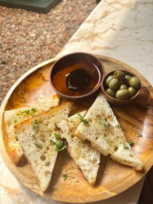 Focaccia with balsamic and whole olives at Loving Earth Cafe in Fort Kochi
