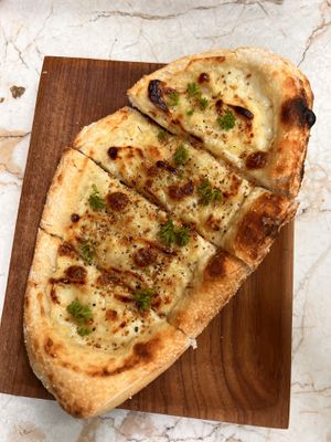 Cheezy garlic bread 🤤   at Loving Earth Cafe in Fort Kochi