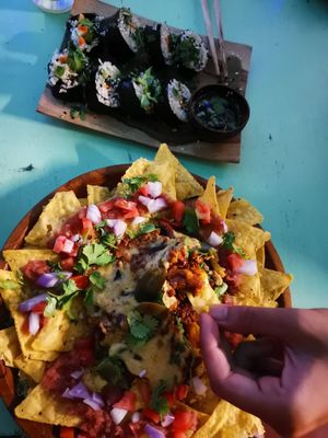 Sushi & cheesy nachos to share - sooo good at Loving Earth Cafe in Fort Kochi
