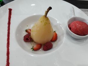 Poire pochée, sorbet fraise at La Primatiale in Nancy