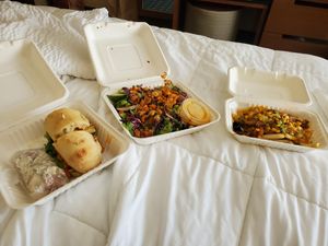 Good deli food 😋  Buffalo Tofu sandwich w/ potato salad, Thai tofu salad and loaded fries! 😃 at Strong Hearts in Syracuse