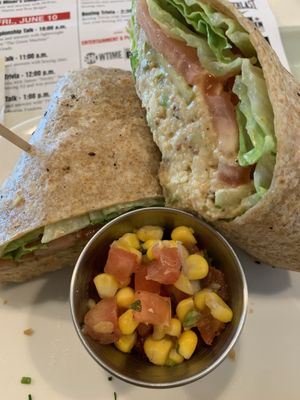 Chickpea salad sandwich with side of corn salsa  at Strong Hearts in Syracuse