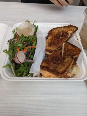 The Reuben with side of greens at Strong Hearts in Syracuse