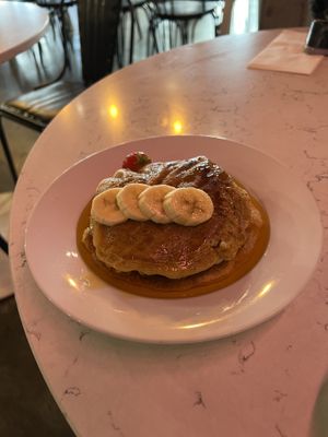 Vegan pancakes with strawberry, bananas, maple syrup  at POG - Tara St in Dublin