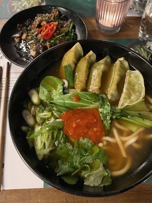 Main dish: vegan ramen with dumplings; size dish: miso aubergine with mushroom and spinach  at Wagamama in Utrecht