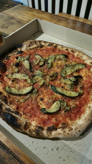 Zucchini added to marinara pizza. at Loro Loco in Koh Lanta