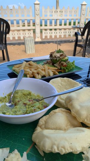 Pappadoms and guac & pumpkin waffle at The Container Beach Restaurant in Negombo