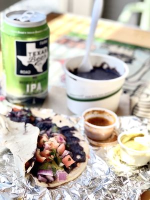 Freaking Vegan and side of refried black beans  at AUS - Tacodeli in Austin