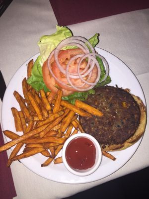 Vegan black bean burger with sweet potato fries  at Kitchen428 Restaurant and Mojo's Lounge in Woodland