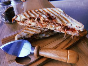 Yacaturkey Sandwich ?cranberrie sauce, cheese, jackfruit, caramelized onions at Gardeno in Tijuana