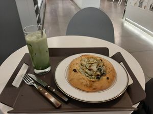 Matcha latte and potato cake at The Bread Blue - Seocho in Seoul
