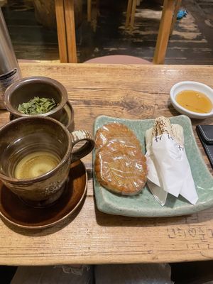 Snacks and green tea. Served with honey, I just left it out.  at Traditional Tea House Insadong (전통 찻집 인사동) in Seoul