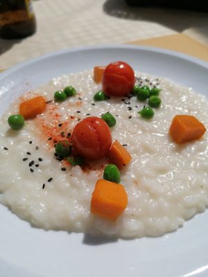 Risotto con piselli, zucca e pomodorini at Agriturismo Teresa delle Fragole in Vigano