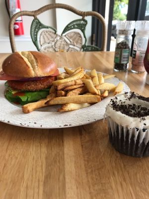 Buffalo CXN Ranch with fries and a cupcake at Veg Eats Foods  in Delray Beach