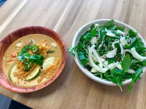 Coconut curry veggie soup and arugula & fennel salad...absolutely delicious!! at Veg Eats Foods  in Delray Beach
