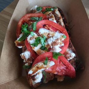 Vegan tomato mozzarella basil caprese on toasted baguette  at Veg Eats Foods  in Delray Beach