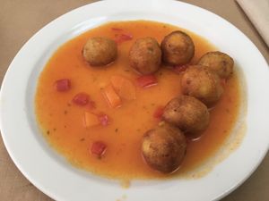 Semolina gnocchi with carrot and red bell pepper sauce at La Riera in Barcelona