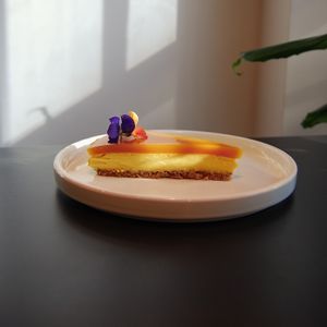 Our new Mango Cheesecake (a creamy cheesecake beneath a velvety mango topping with a biscuit base) at Soul Food Kitchen in Glasgow