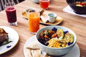 Selection of our fresh juices and our mediterranean bowl at Soul Food Kitchen in Glasgow