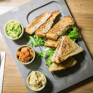 trio of hummus with bread at Soul Food Kitchen in Glasgow