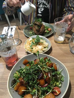 Sweet potato w/ haghis, kimchi, salad w/ butternut squash & roasted apple 💚 at Soul Food Kitchen in Glasgow