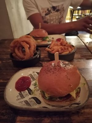 THIS burgers, massive onion rings , and skin on fries at HUB St Ives in St Ives