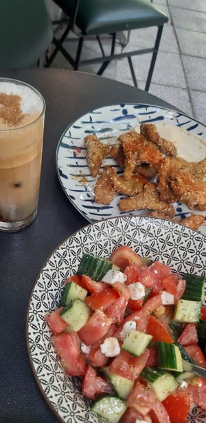 Greec salad, delicious mushroom nuggets and Iced cappuchino at Tarantula in Thessaloniki