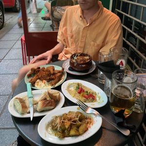 Split pea purée with bread; mushroom nuggets; potatoes with lemon, thyme and garlic; bougiourdi vegan cheese fondue.  at Tarantula in Thessaloniki