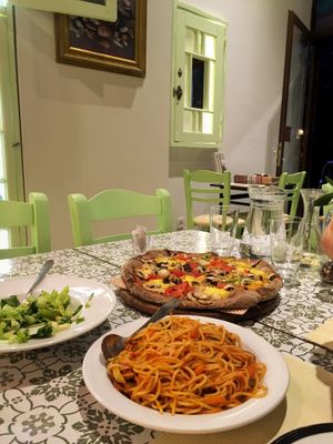 Salad, pizza, and pasta at Mystic Vegan in Athens