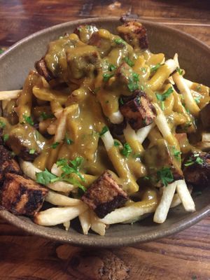 Curry Jerk Tofu Fries. You get a healthy portion. It’s was delicious IMO. at Caribbean Haven in Ventura