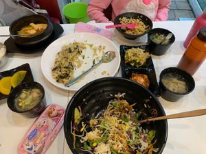 Fried rice and bibimbap. She also brought us special made sides and soup.  at Bonga in Incheon