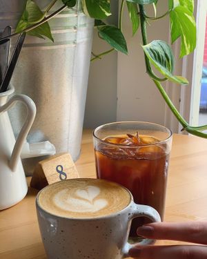 Front: Dirty Chai with Oat Milk - Back: Iced Long Black at Flora by Greenhouse Canteen in West End