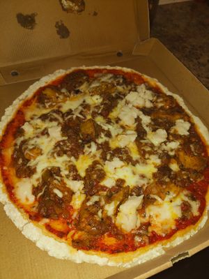 Seitan bhuna pizza with glutin free base 🍕 at Karma Kitchen Cafe in Newcastle Upon Tyne