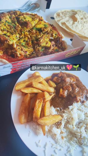 Seitan bhuna pizza, tofu tikka masala curry and garlic rice 🥰 at Karma Kitchen Cafe in Newcastle Upon Tyne
