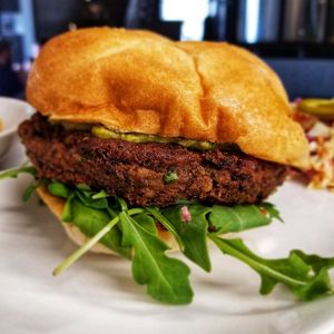 Just gawk in amazement at the size of our Black Bean Rice Burger with Spicy Guac! 
 at Flora Hall Brewing in Ottawa