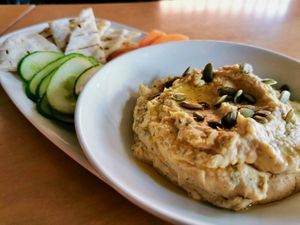 lemon & dill hummus w crudités & our house-made flatbread. at Flora Hall Brewing in Ottawa