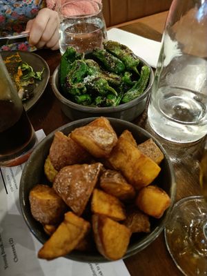 Pimientos del padrón (top), patatas bravas (bottom) at EDO in Belfast