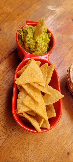 Guacamole with spicy corn chips at Kula in Pisac
