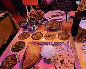 Vegan tali onion basin and aubergine curry. The green dip in the trio is NOT vegan at Indian Lounge in Nice