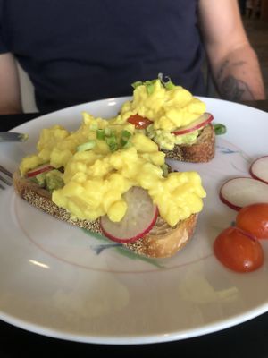 Bad toast with scrambled eggs. Scrambled eggs are made of a tasteless chickpea cream. The texture is weird  at Asa Vegan Kitchen and Studio in Chiang Mai
