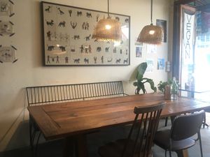 The cafe is adorned with beautiful textiles made by local hill tribes  at Asa Vegan Kitchen and Studio in Chiang Mai