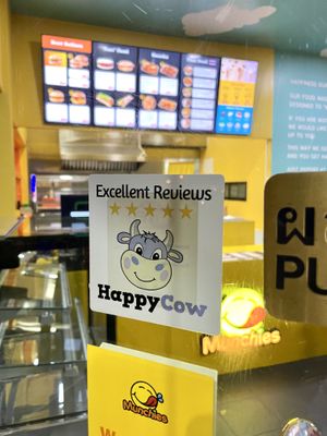 Happy cow window decal  at Munchies Tha Phae Gate in Chiang Mai