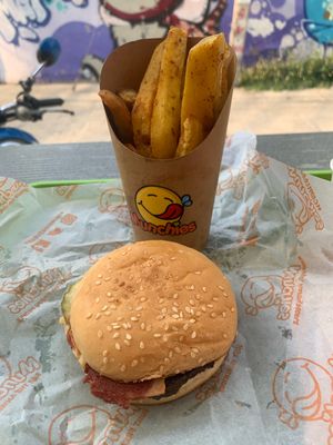 Cheeseburger and potato wedges meal  at Munchies Tha Phae Gate in Chiang Mai
