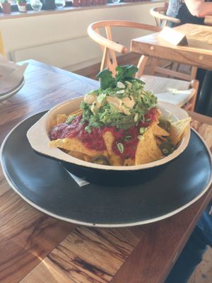 Vegan nachos with vegan cheese YUM  at Rise in Bridport