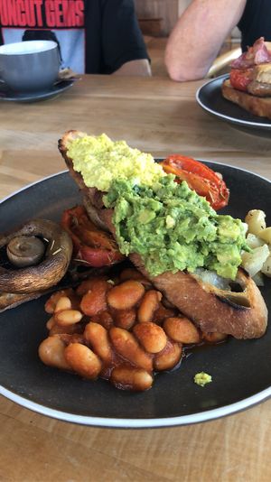 vegan breakfast - tofu scramble, avocado, mushrooms, tomatoes, beans, sourdough toast and potatoes  at Rise in Bridport