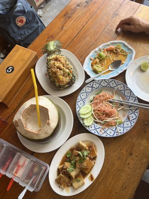 Coconut smoothie (they don’t put dairy), mango salad (no fish sauce) pineapple fried rice tofu, coconut vermicelli noodles, and tamarind tofu  at Mangrove in Krabi